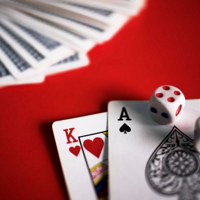 Blackjack cards on red table